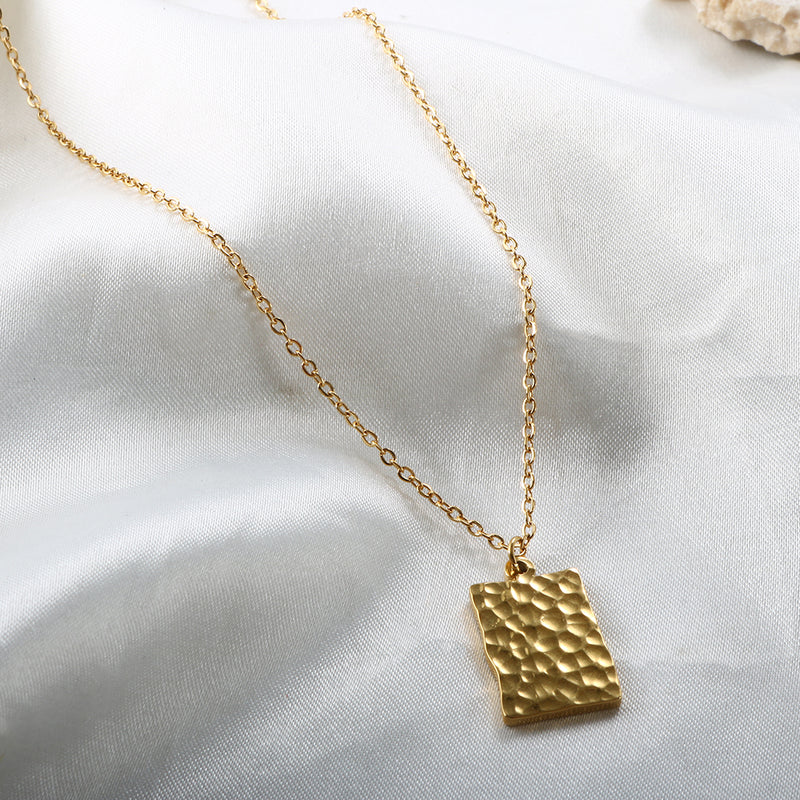 embossed tag necklace